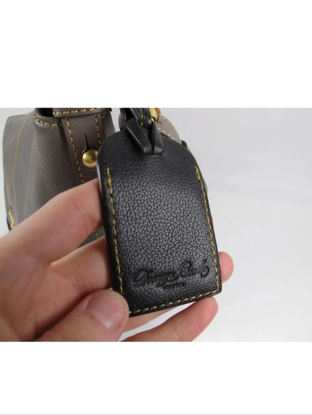 Dooney & Bourke Gray/Black Sophie Pebbled Leather Tasseled Hobo Bag w bag Charm